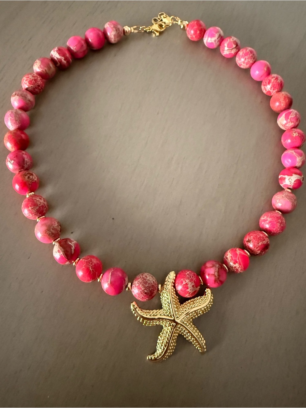 Gold Starfish Pendant Necklace with Pink Beads